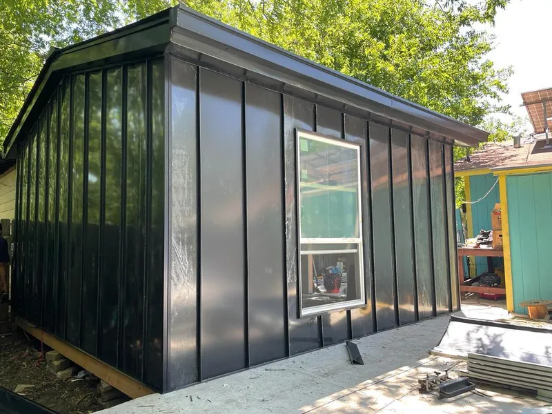 Black standing seam metal wall panels for Roof Inspection in Kiryas Joel